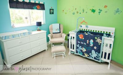 An ocean themed, under the sea nursery design for a baby boy.  Photos by Lauren Glase Photography