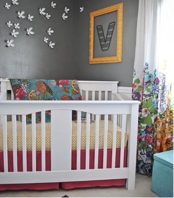 A slightly different baby girl's nursery decorated without lace or pastel pink.  