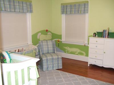 Our Baby Boy's Golf Theme Nursery.  The color scheme is baby blue and leaf green.  The baby bedding set is made using blue and green houndstooth fabric fabric that coordinates beautifully with the plaid fabric that I used for the window valances and chair upholstery.