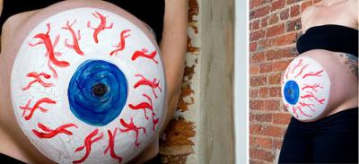 Halloween Pregnancy Belly Painting Ideas.  A pregnant belly painted like an eyeball.