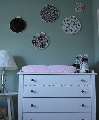 PInk and White Baby Changing Table with Black and White Polka Dot Drawer Pulls w Vintage Fabric Wall Decorations
