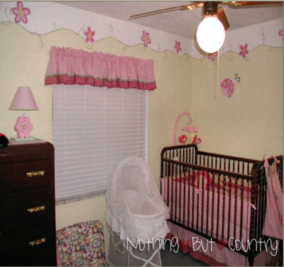 Pastel Yellow and Pink Nursery Decor with Flowers and Ladybugs