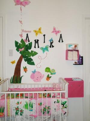 Small pink baby girls rainforest nursery theme design and decorating ideas.