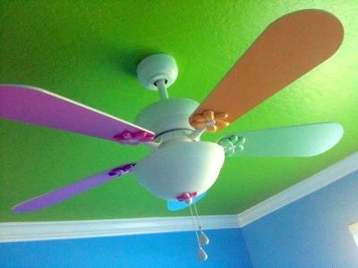 Nursery ceiling fan with custom painted fan blades to match our ocean theme nursery colors