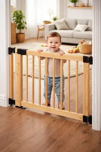 Baby gate installed at a doorway in a home with young children