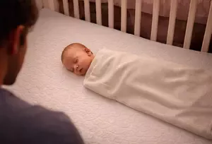 Firm crib mattress for newborn sleep in a safe, well-fitted crib