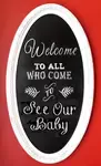 chalkboard nursery welcome sign