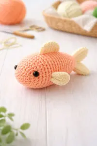Crochet fish pattern finished as a soft handmade amigurumi fish toy