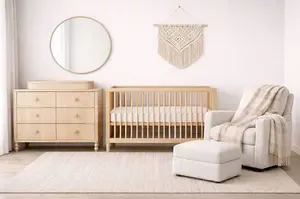 Nursery floor plan layout with crib, dresser, and glider placed for clear walking paths