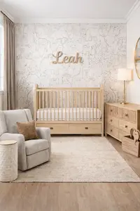 Neutral nursery with convertible crib and timeless decor designed to grow with a child