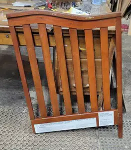 Right side of a  Heritage 3500 baby crib. 
