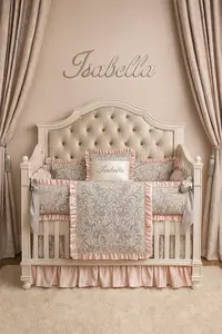Elegant damask pink gray and white baby girl nursery crib bedding with ruffles and monogram
