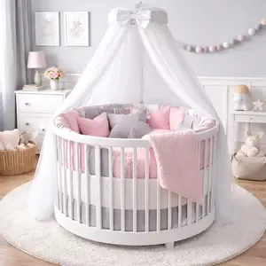 ound baby crib with pink, grey, and white bedding in a modern nursery