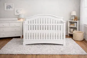 Simmons baby crib in a neutral nursery setting showing a classic convertible crib 