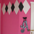 Hot pink white and black baby girl nursery with argyle diamonds wall painting technique using paint and faux jewels as bling