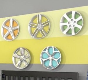 Vintage hubcaps on a baby boy vintage cars theme nursery room wall