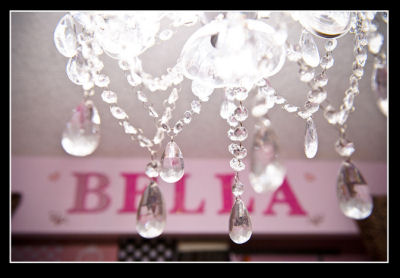 Luxurious crystal chandelier in Annabella's princess nursery.