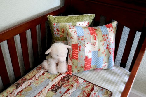 The homemade crib quilt that inspired the vintage nursery design for the historic craftsman style home