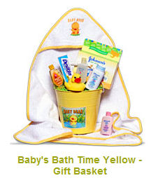 Baby duck theme bath baby shower gift basket.  A yellow rubber ducky a personalized bath towel, soap and shampoo make a lovely presentation.