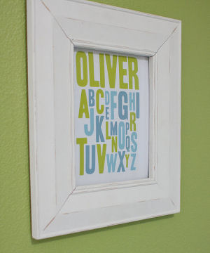 Framed baby name and alphabet letters art print for the nursery.