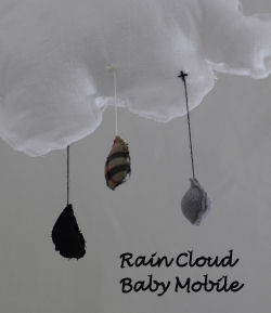 handmade homemade rustic rain cloud baby crib nursery mobile fabric burberry raindrops