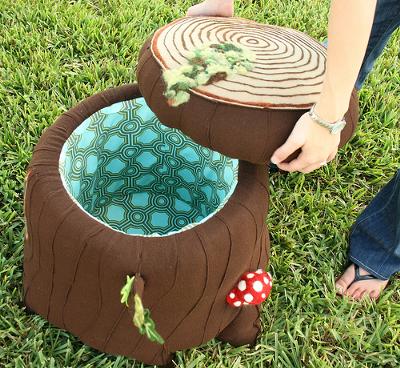 Upholstered tree stump forest theme storage compartment stool with mushrooms for a baby nursery room