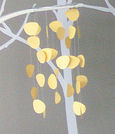 modern homemade yellow baby crib mobile paper