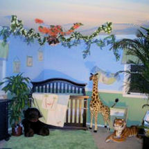 Neutral jungle themed nursery with giant stuffed giraffes, tigers and monkey theme baby crib bedding