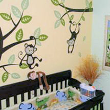 Monkey theme baby girl nursery wall decorated with decals