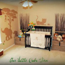 Mama and baby elephants, monkey and tree silhouette art on the walls of a jungle baby nursery theme stenciled with chocolate brown paint