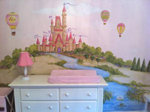 Baby girl pink and white changing table area with a princess castle mural on the nursery wall