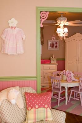 Antique white, mint green and pink country cottage nursery with plaid and polka dots baby bedding and wooden wall letters hung by hot pink and green ribbons on the wall behind the crib.