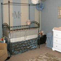 Restful baby boy nursery room with a blue silver and ivory color scheme