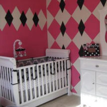 Pink, black and baby girl nursery room with unique argyle wall painting technique with faux jewels accents
