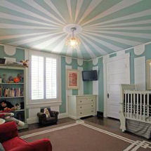 Vintage circus theme nursery for a baby boy with blue and cream white custom ceiling painting technique
