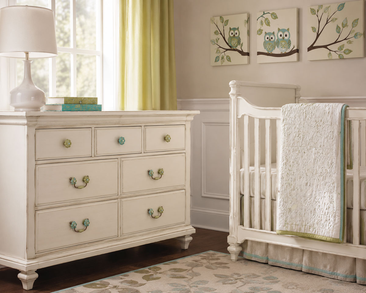 Antique white nursery dresser and crib updated with decorative lime green and turquoise drawer pulls
