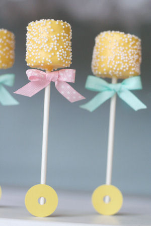 Yellow and blue decorated April baby shower marshmallow pops