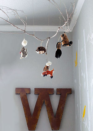 Homemade DIY tree branch baby mobile with forest animals decorations fox badger squirrel fox owl
