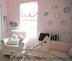 Pink balloon shades for a baby girl nursery window