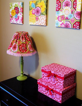 Custom homemade wall art, fabric lamp shade and stacking keepsake boxes for a baby girl's nursery