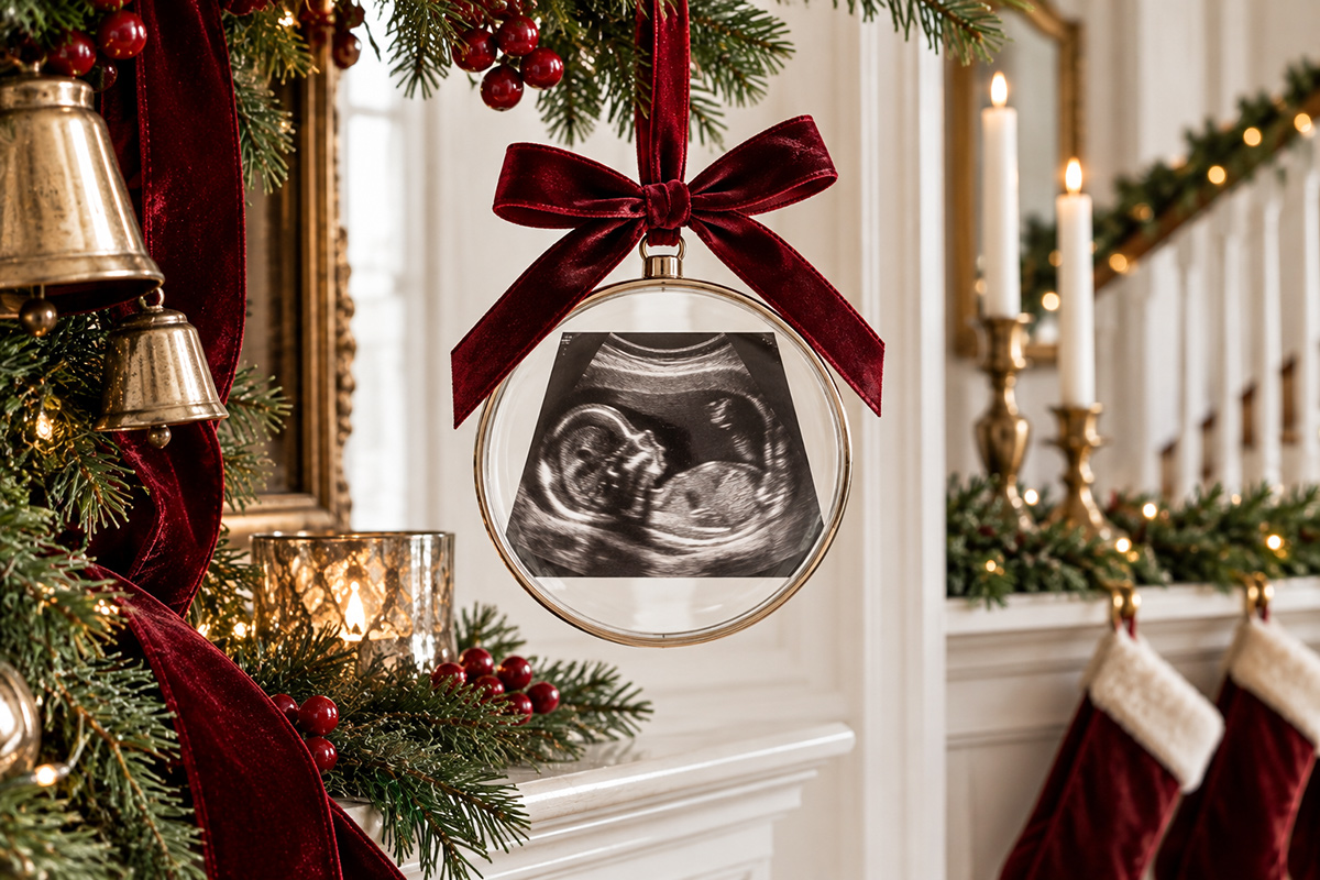 Christmas baby announcement ornament with an ultrasound photo and elegant burgundy ribbon