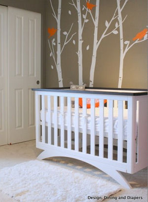 Modern orange brown and white modern baby nursery room with 3d birdhouse tree wall mural