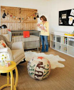 Rustic barn door wainscoting in a baby boy farm theme nursery