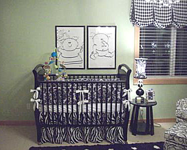 Black white and sage green boy girl nursery for twins