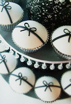 Jeweled decorated black and white baby shower cupcakes