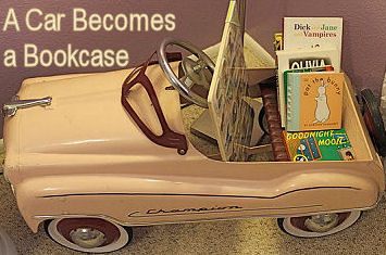 A girl's pink vintage pedal car in a nursery room
