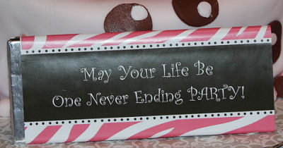  Personalized pink and brown zebra print candy bar wrappers with a saying for a baby girl baby shower.