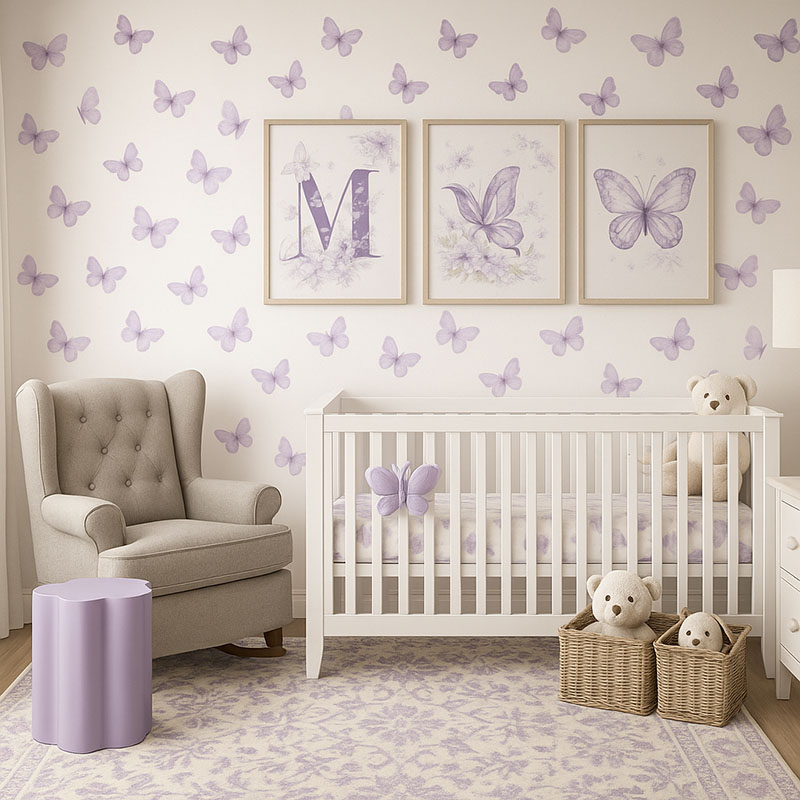 Purple butterfly nursery theme inspired by Taylor Swift with lavender wall decals, white crib, and fairy wall art