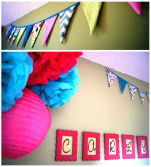 Hot pink and baby blue nursery ceiling mobile made from paper lanterns and tissue paper flowers