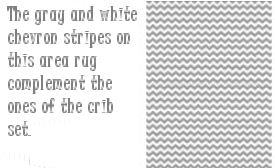 Gray and white nursery area rug with chevron stripes